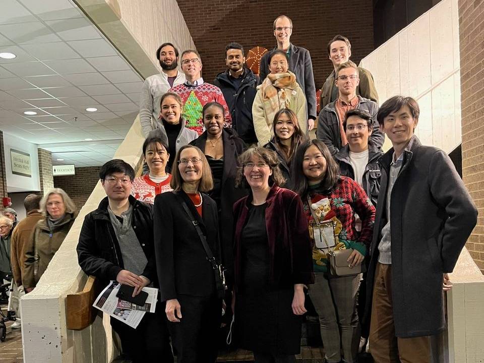 Group of people holding playbills