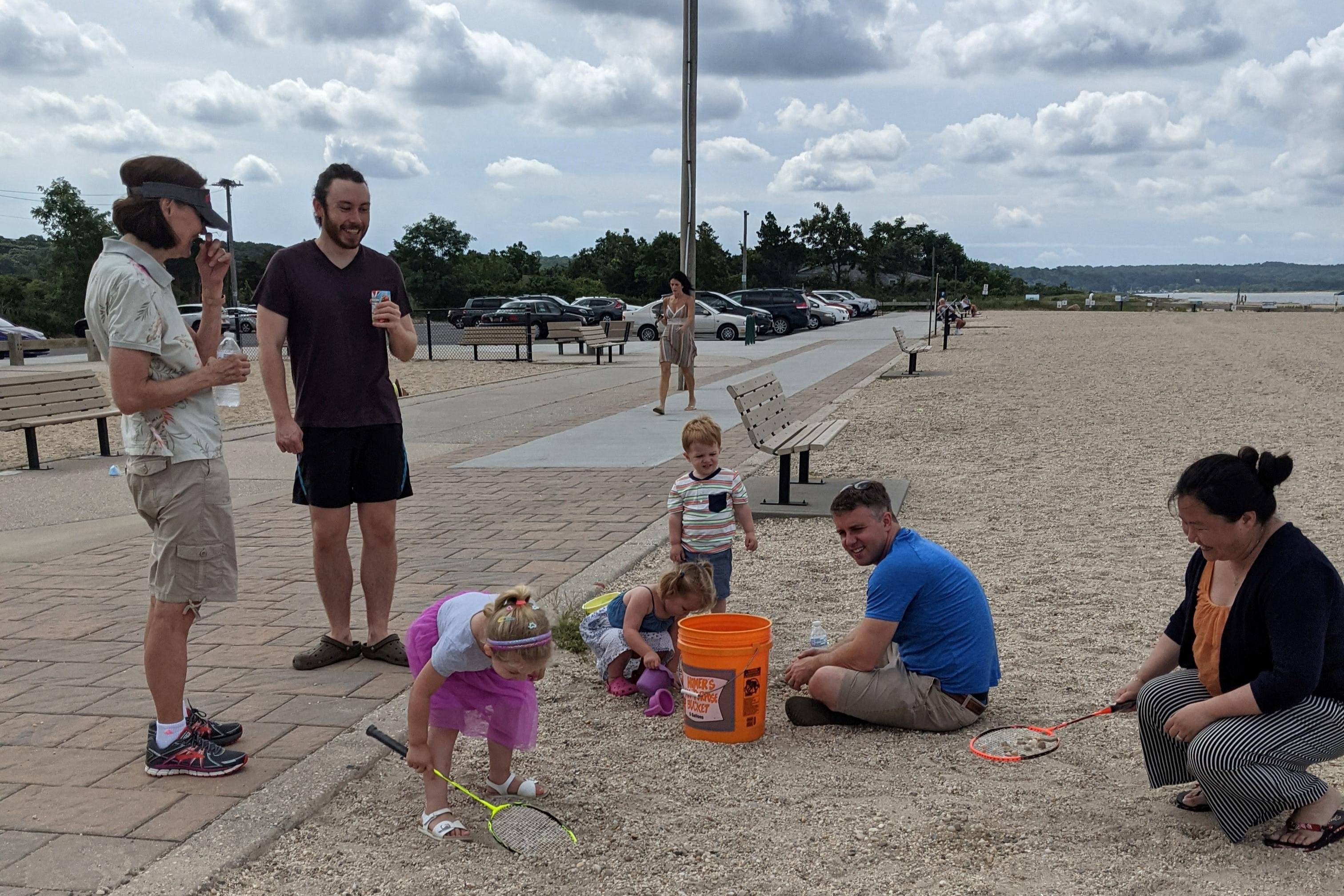 Family sitting on the beach