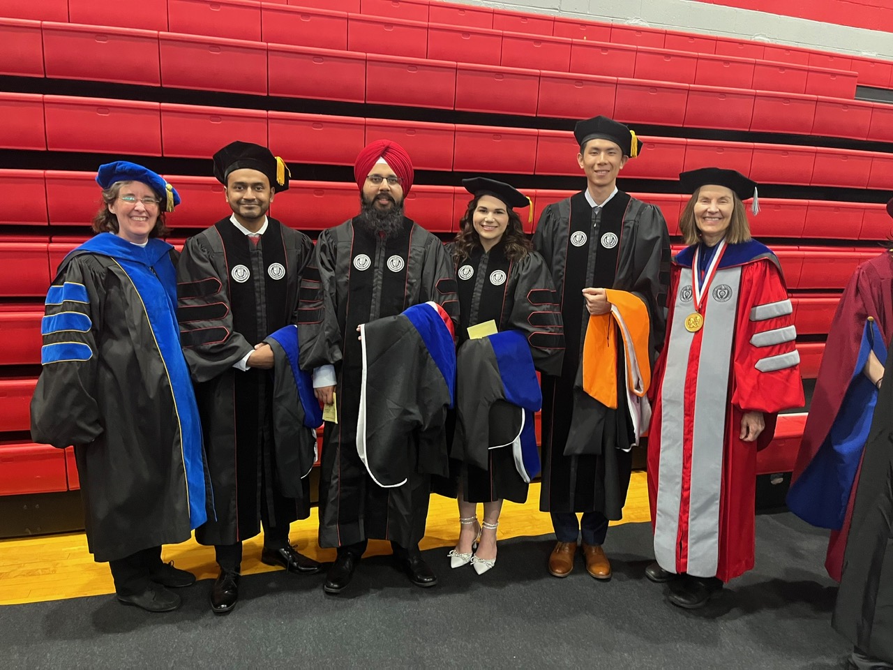 Group of students in graduation gowns