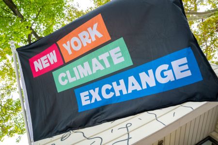 New York Climate Exchange banner displayed outdoors on campus