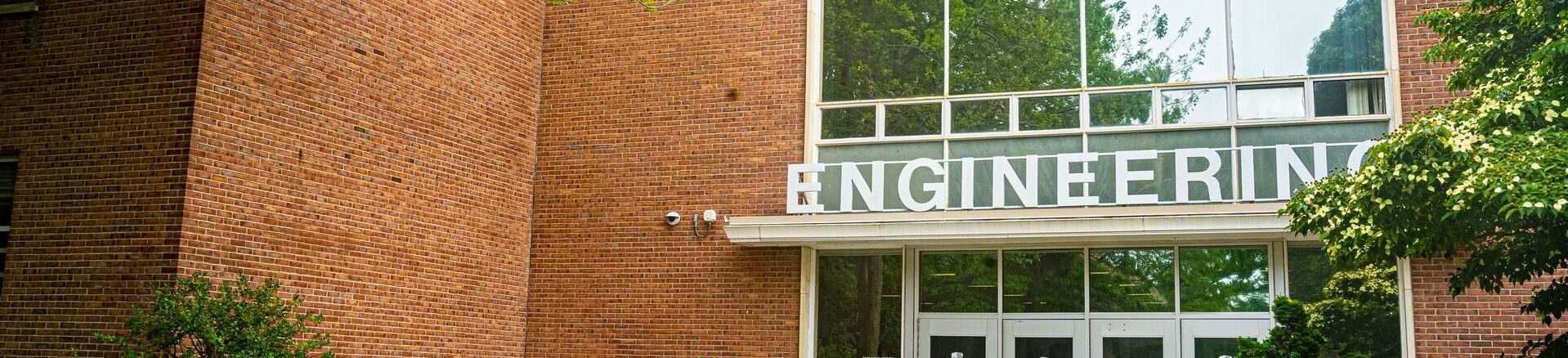 Entrance of the Engineering building with large "ENGINEERING" lettering above the main entrance
