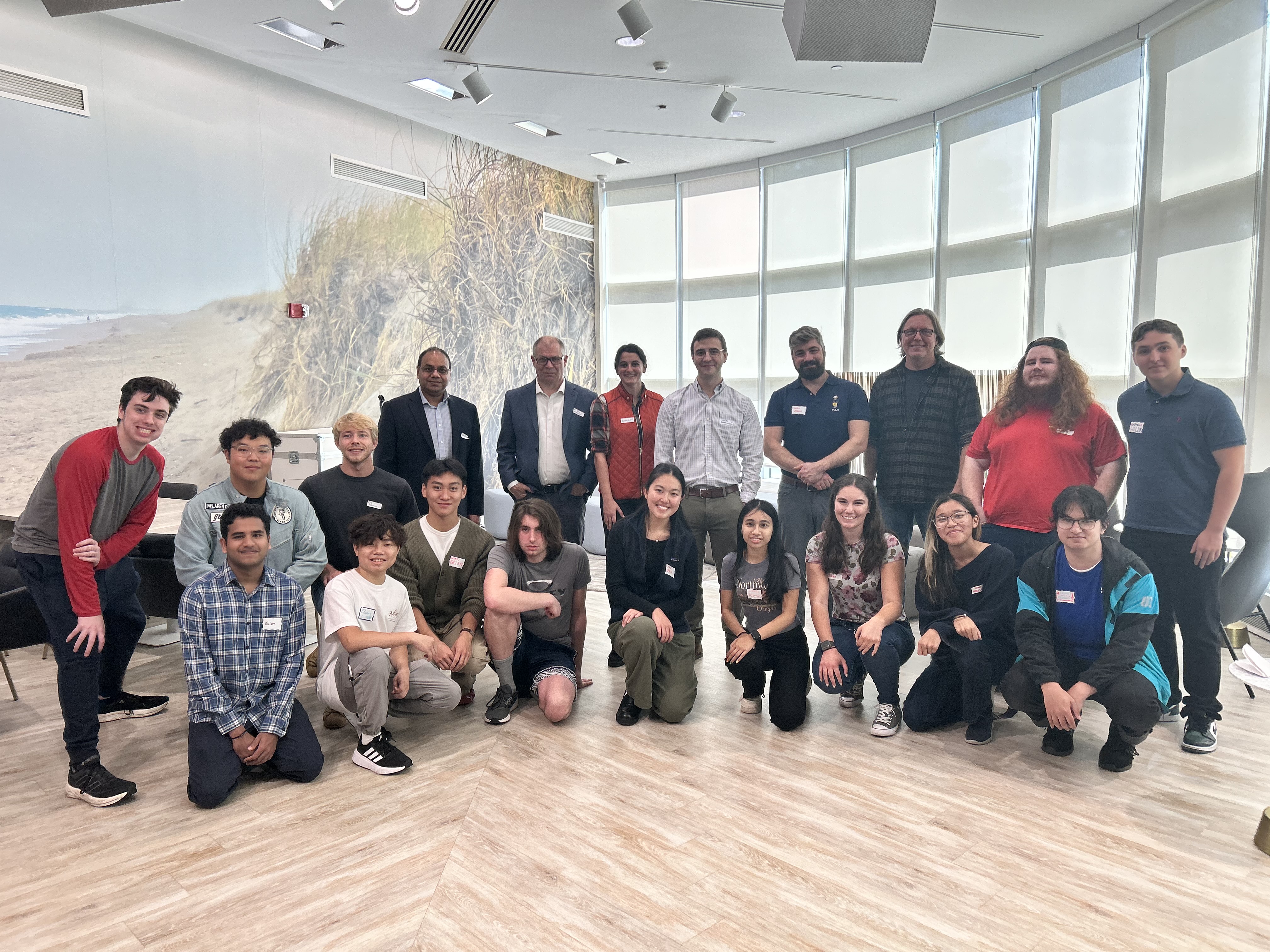 A group photo of students, faculty, and staff at the ASME social