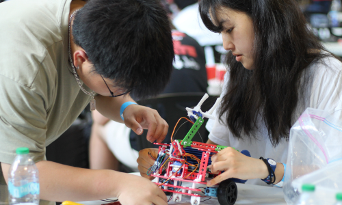 Students from the SBU chapter of ASME work on their human powered vehicle project