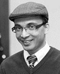 Black and white colored, headshot of Dr.Krishna Bista with glasses in a hat