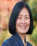 Headshot of Xiao Lan Curdt-Christiansen in blue shirt