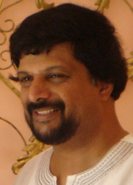 Headshot of Suresh Canagarajah smiling