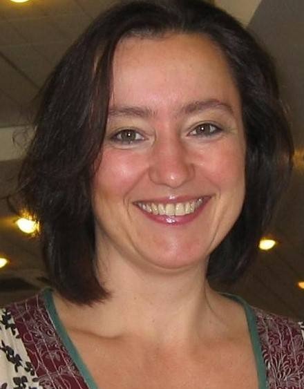 Headshot of Loredana Polezzi with short hair, smiling