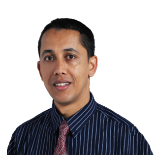 Shyam Sharma headshot smiling in suit and tie