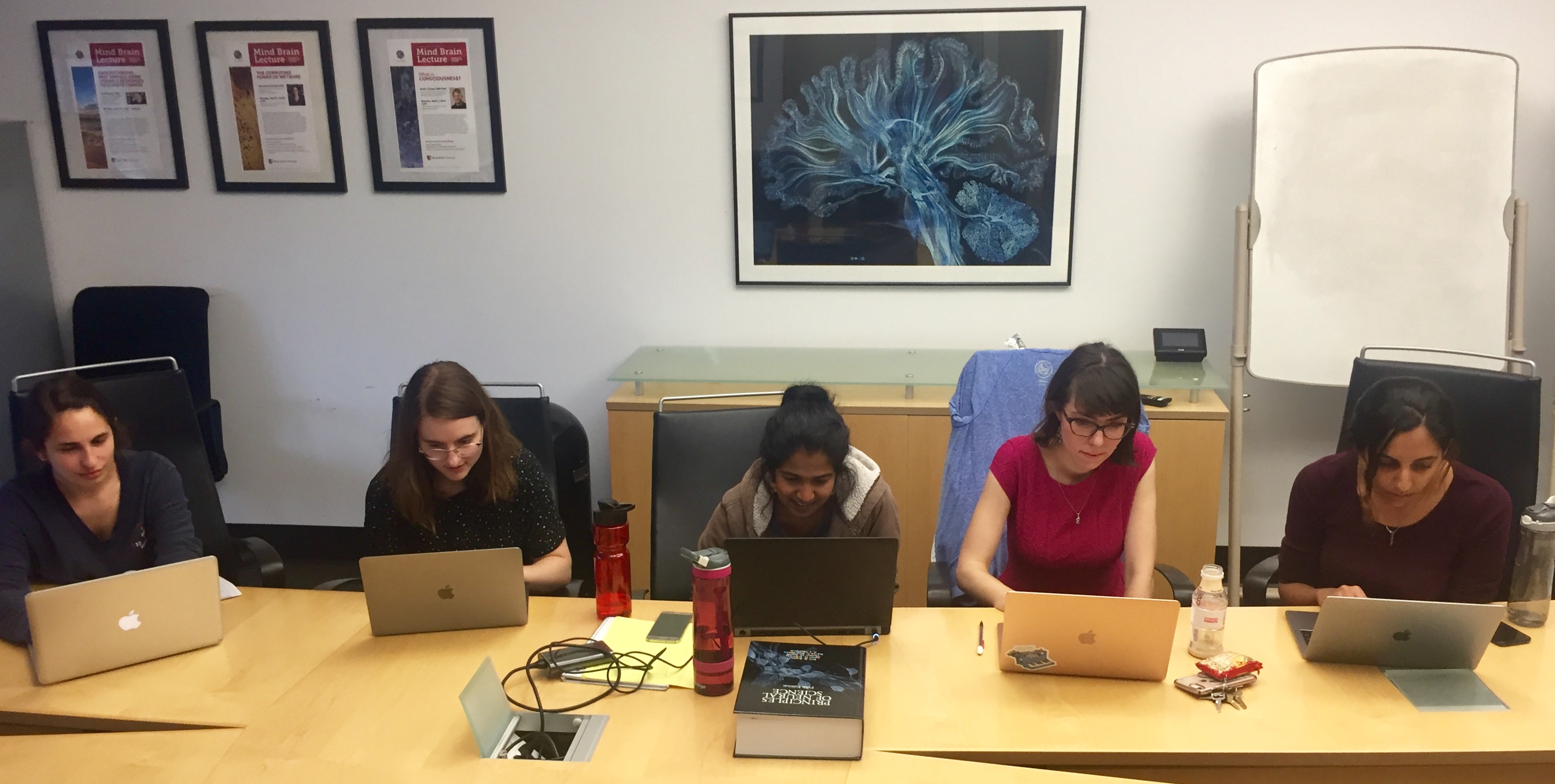 Students studying in conference room
