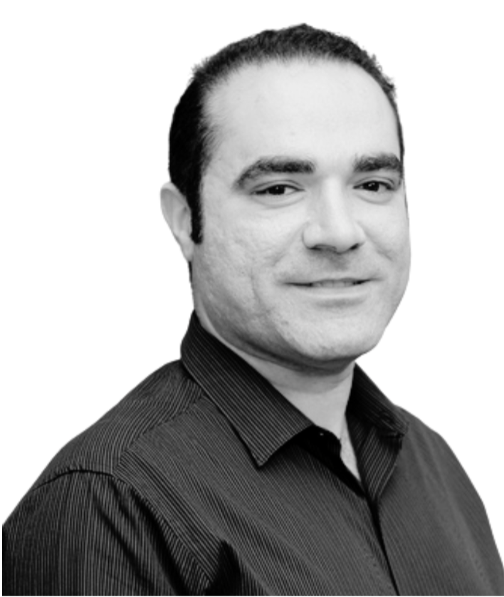 Black and white headshot of Shahriar SheikhBahaei in front of a white background