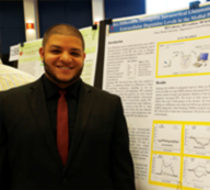 Ramon Cabrera stading at a poster