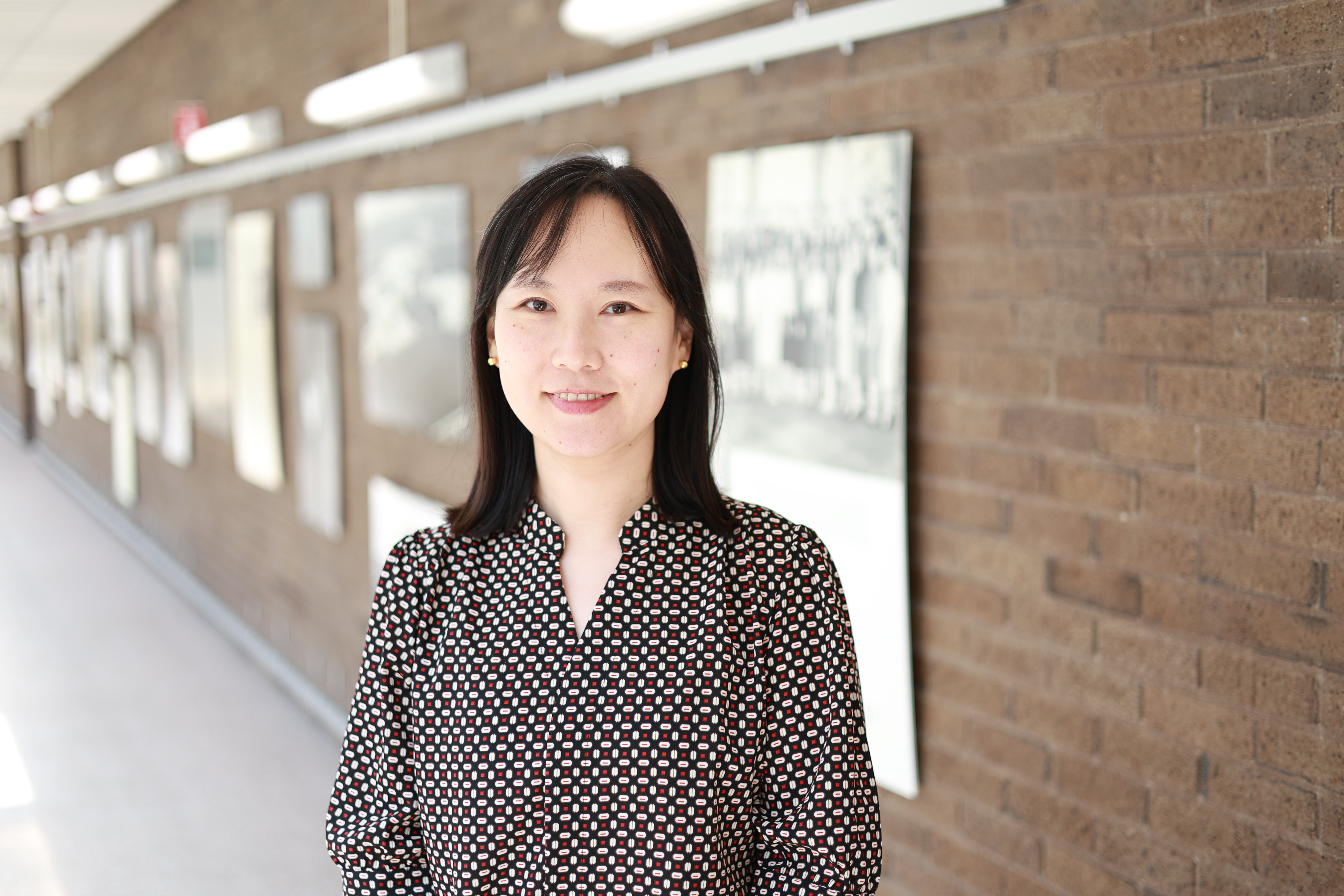 Ling Zhai, Program Evaluator, smiling in a professional headshot