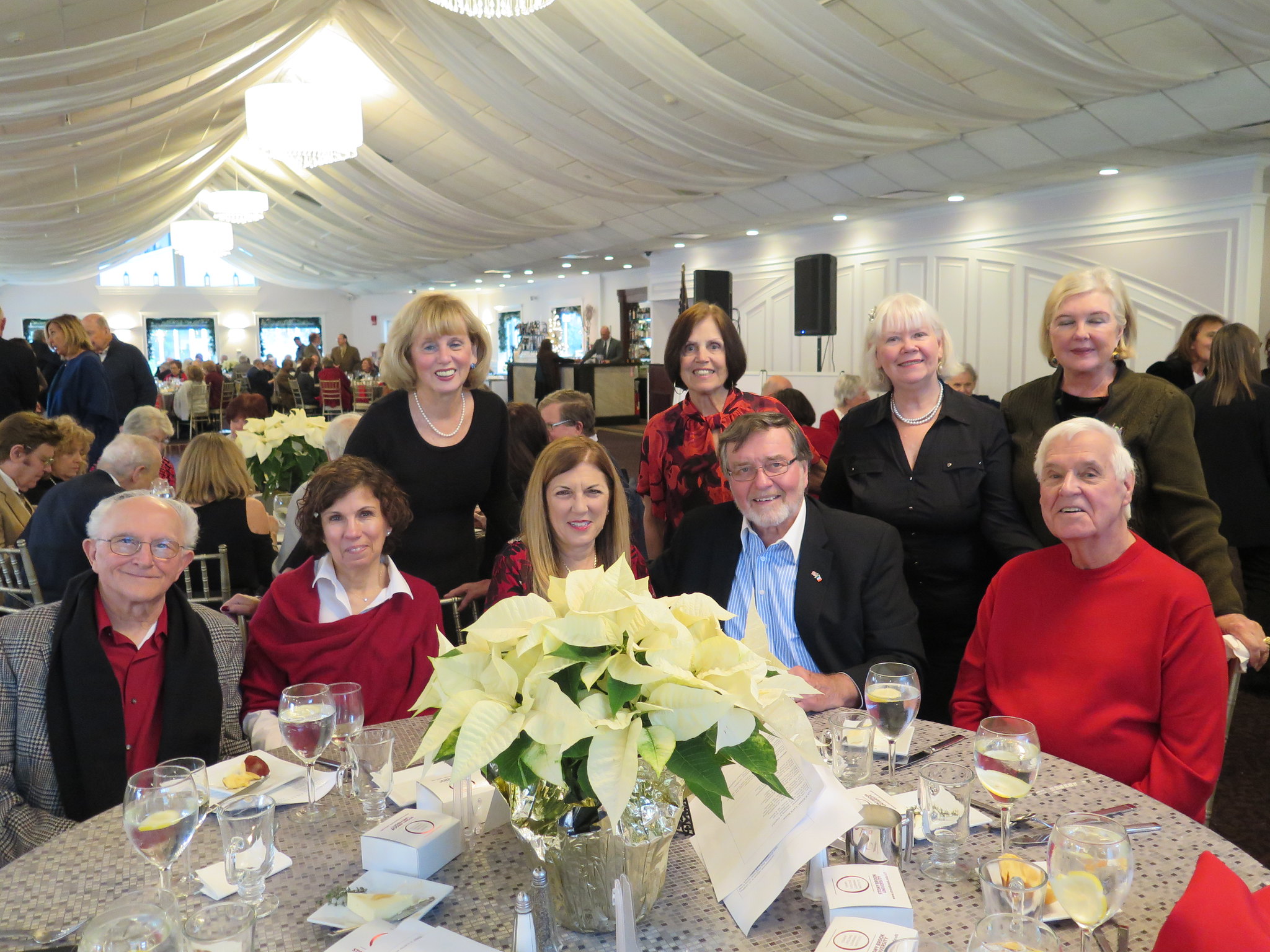 Members sitting around table at a luncheon