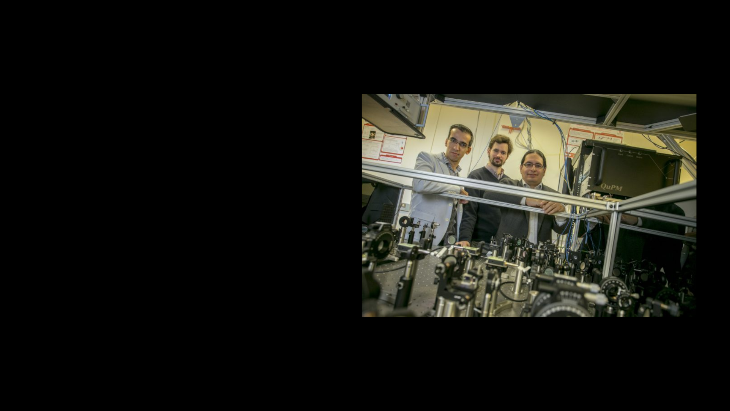 (left to right) Mehdi Namazi, Mael Flament and Eden Figueroa in their Physics & Astronomy laser lab.