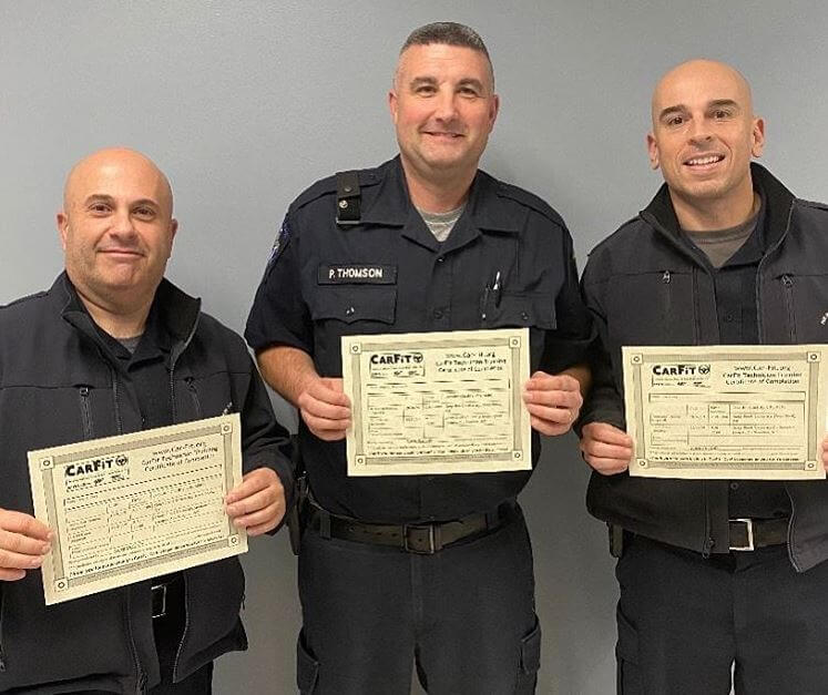 CRT team holding up certificates for Car Fit