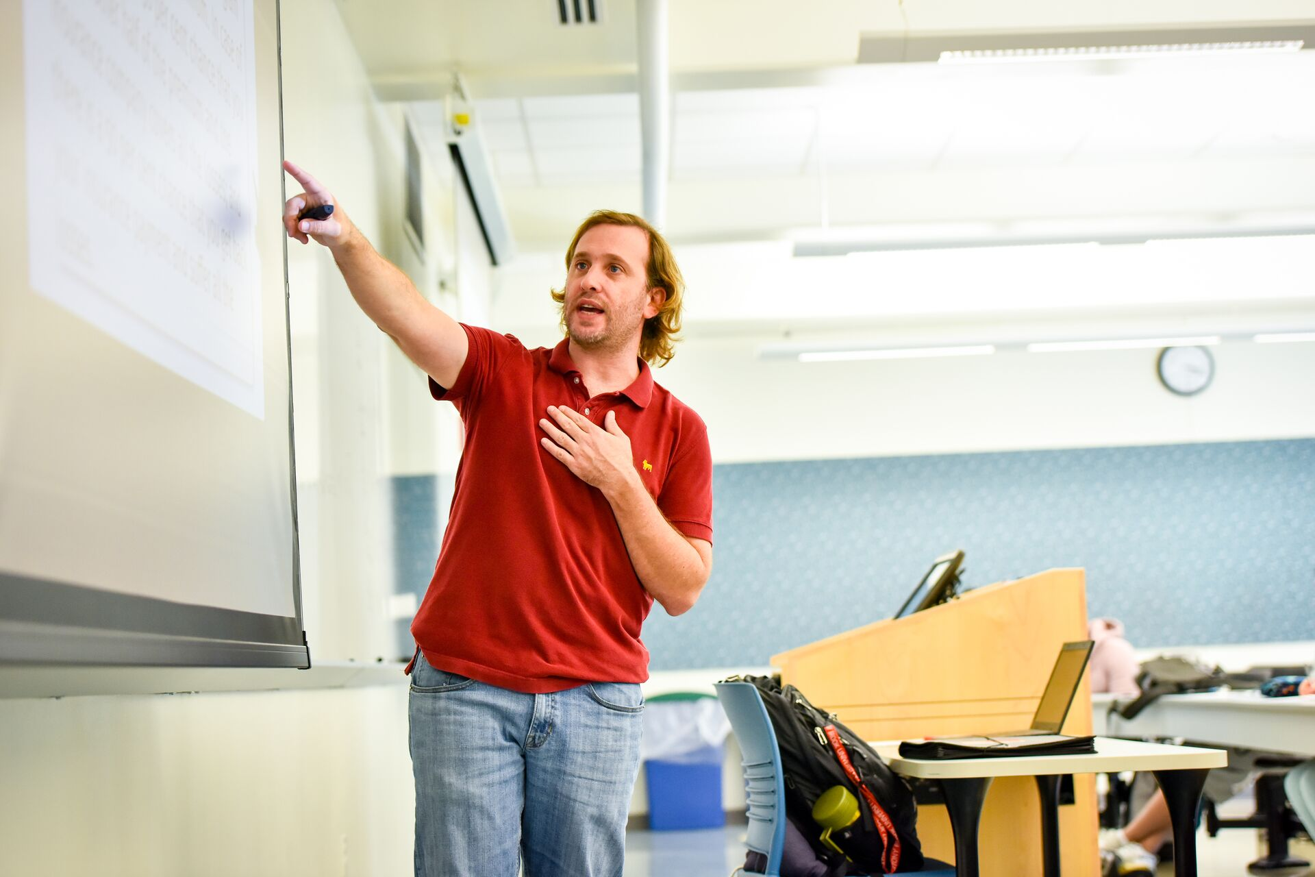 Teacher educating students