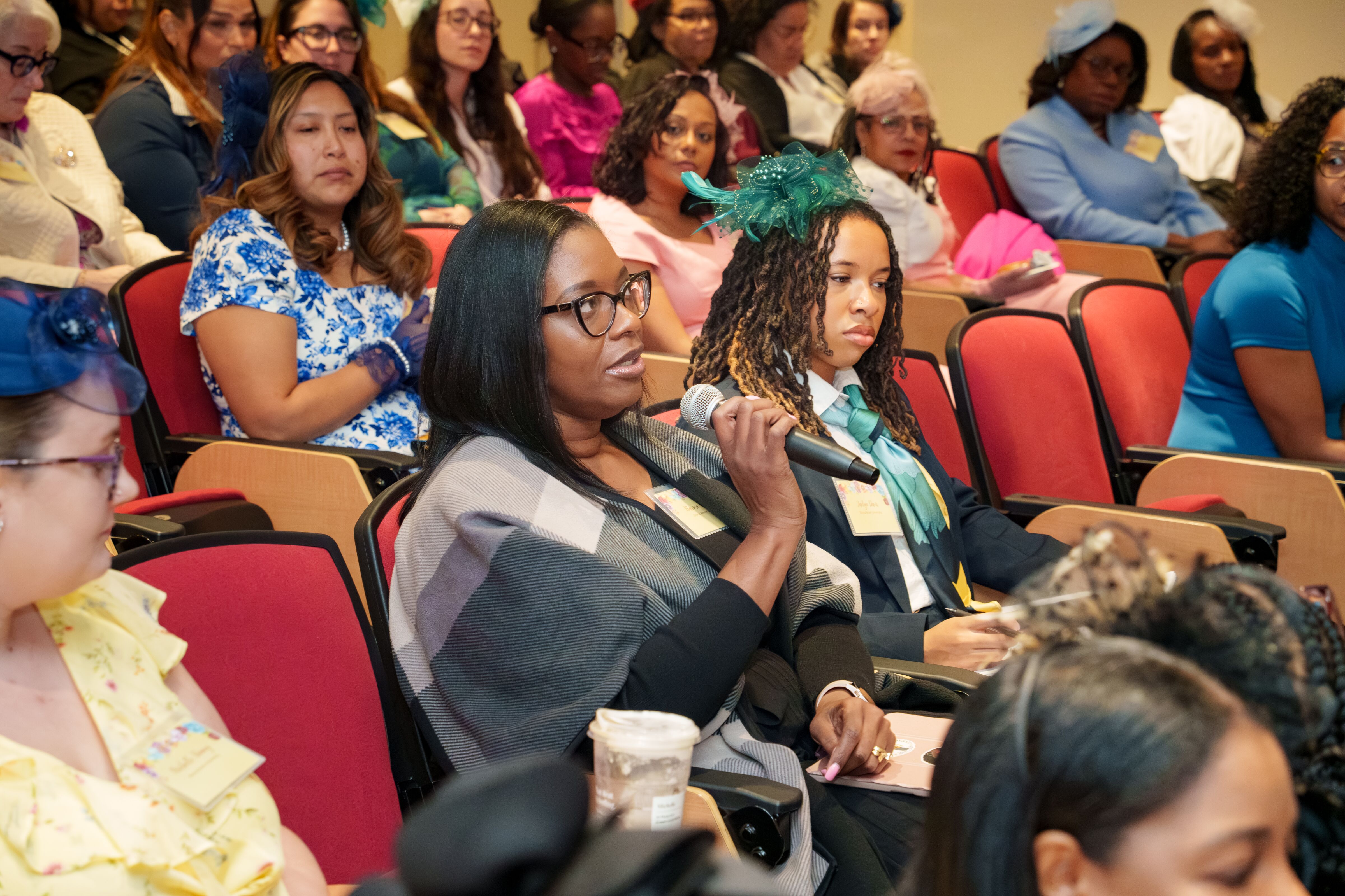 An attendee participates in a conference session