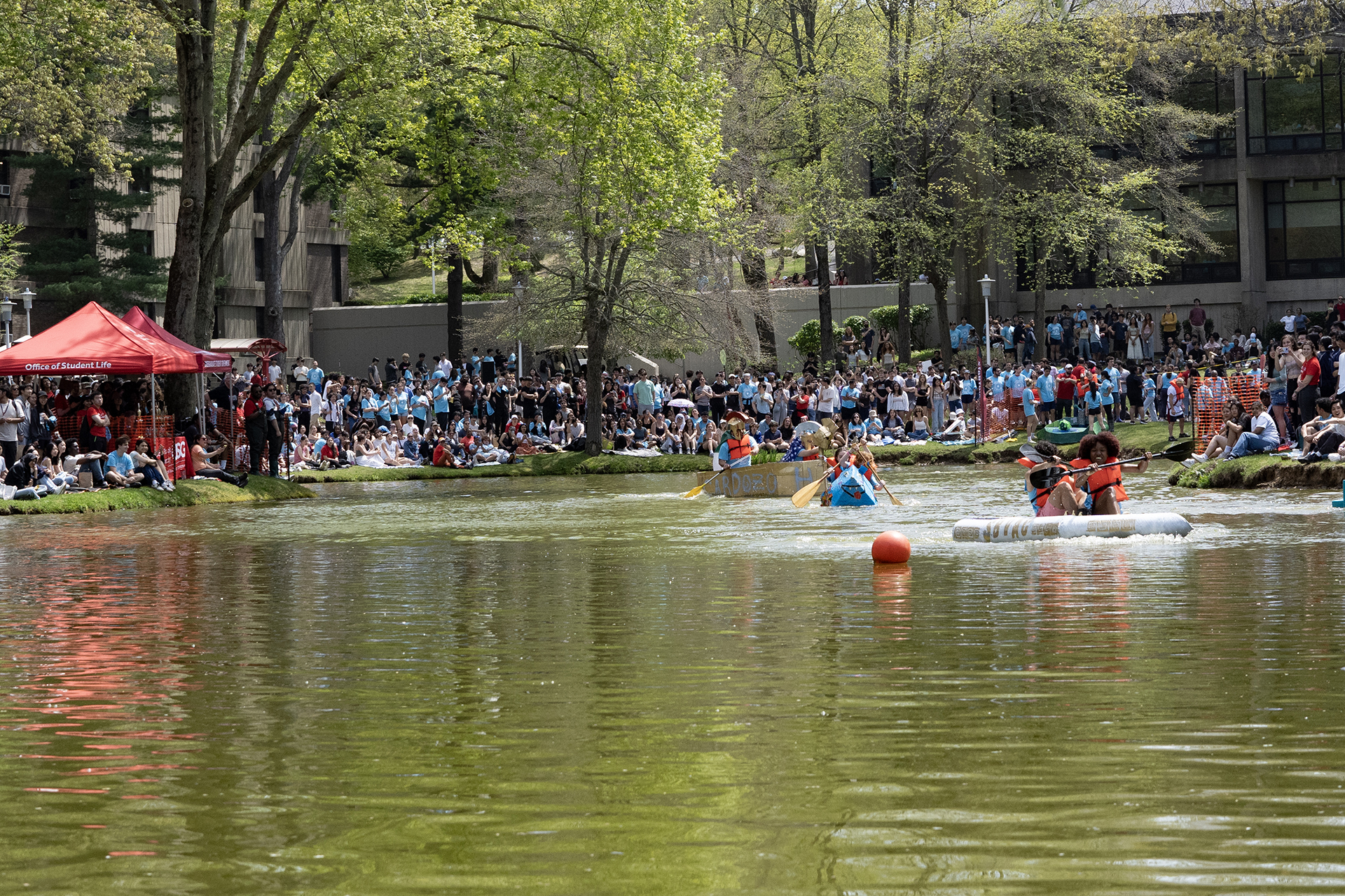 Students gathered around Roth Pond for Roth Regatta.