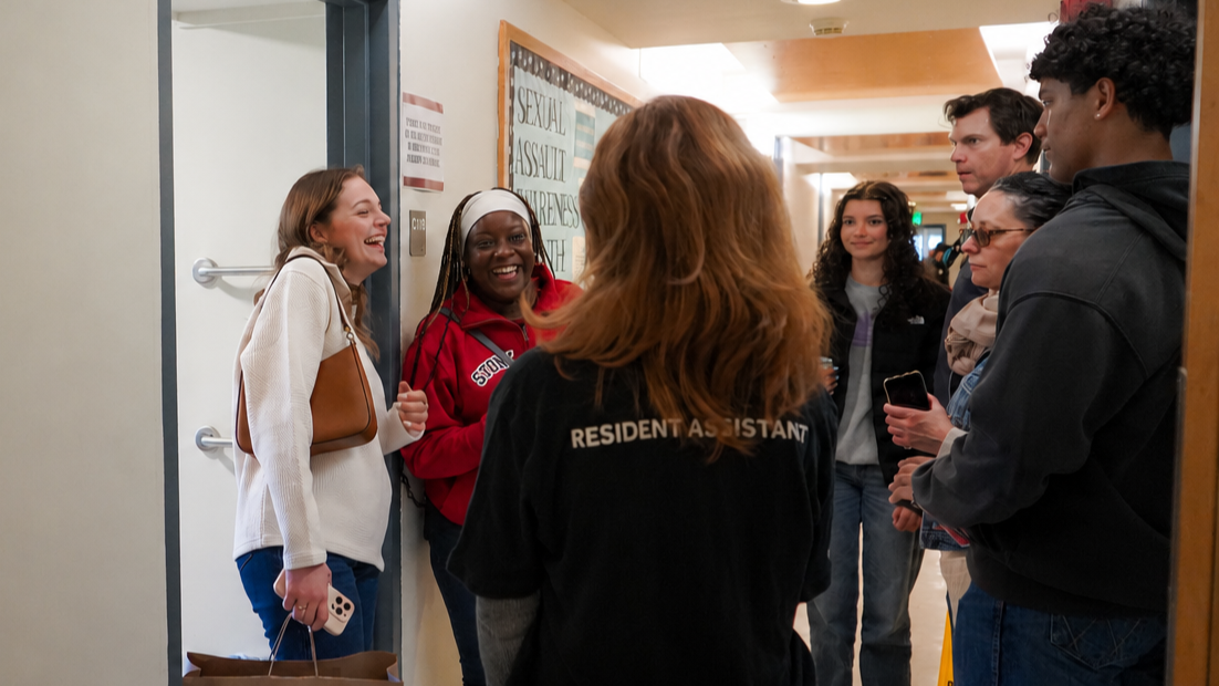 A Resident Assistant gives students a tour