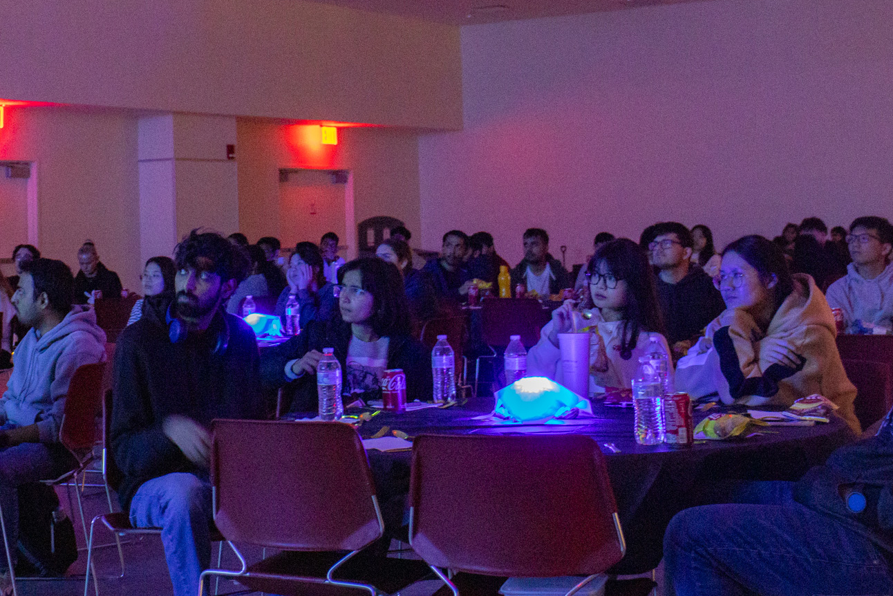 Students watching a movie together.