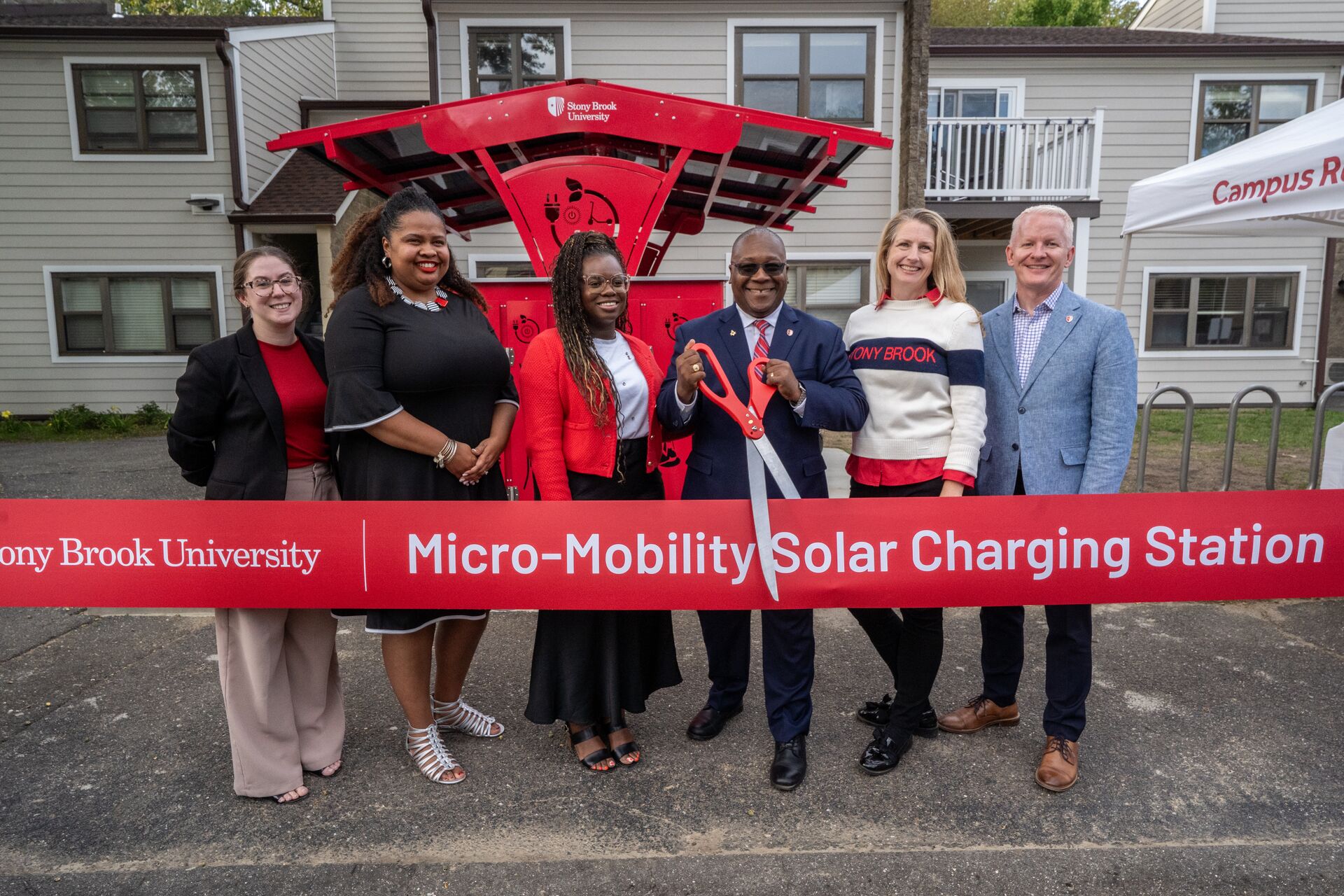 staff attend ribbon cutting ceremony