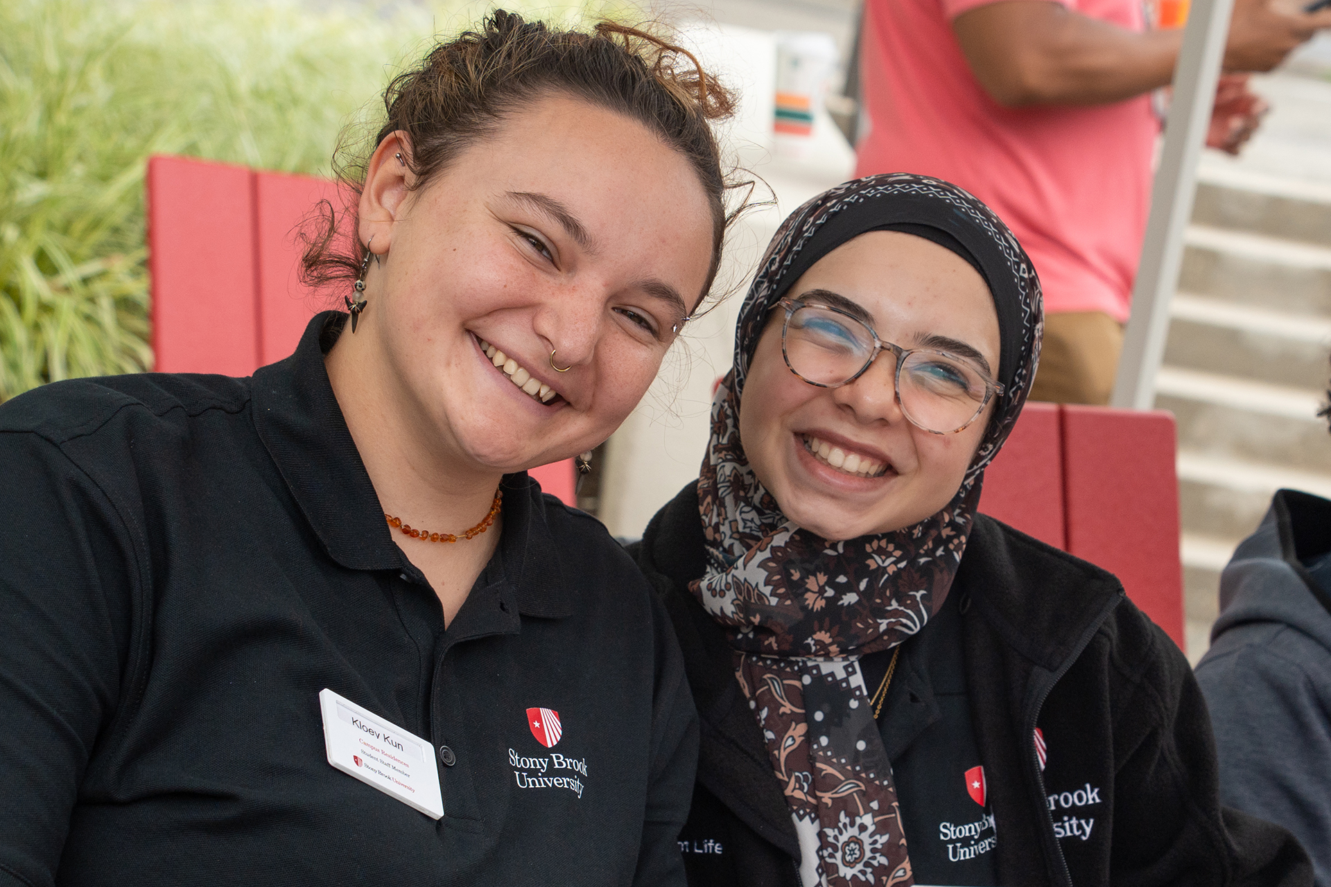 Two Campus Residences student employees smiling