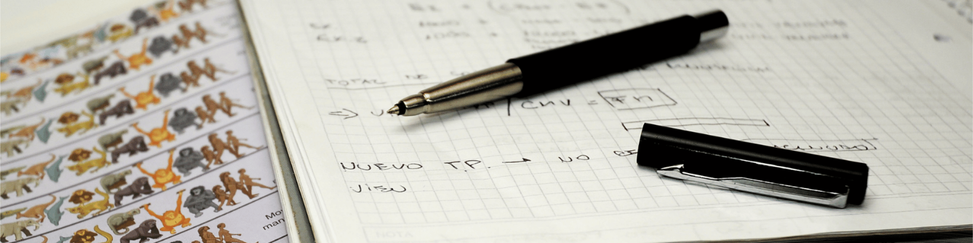 Pen, notebook and textbook