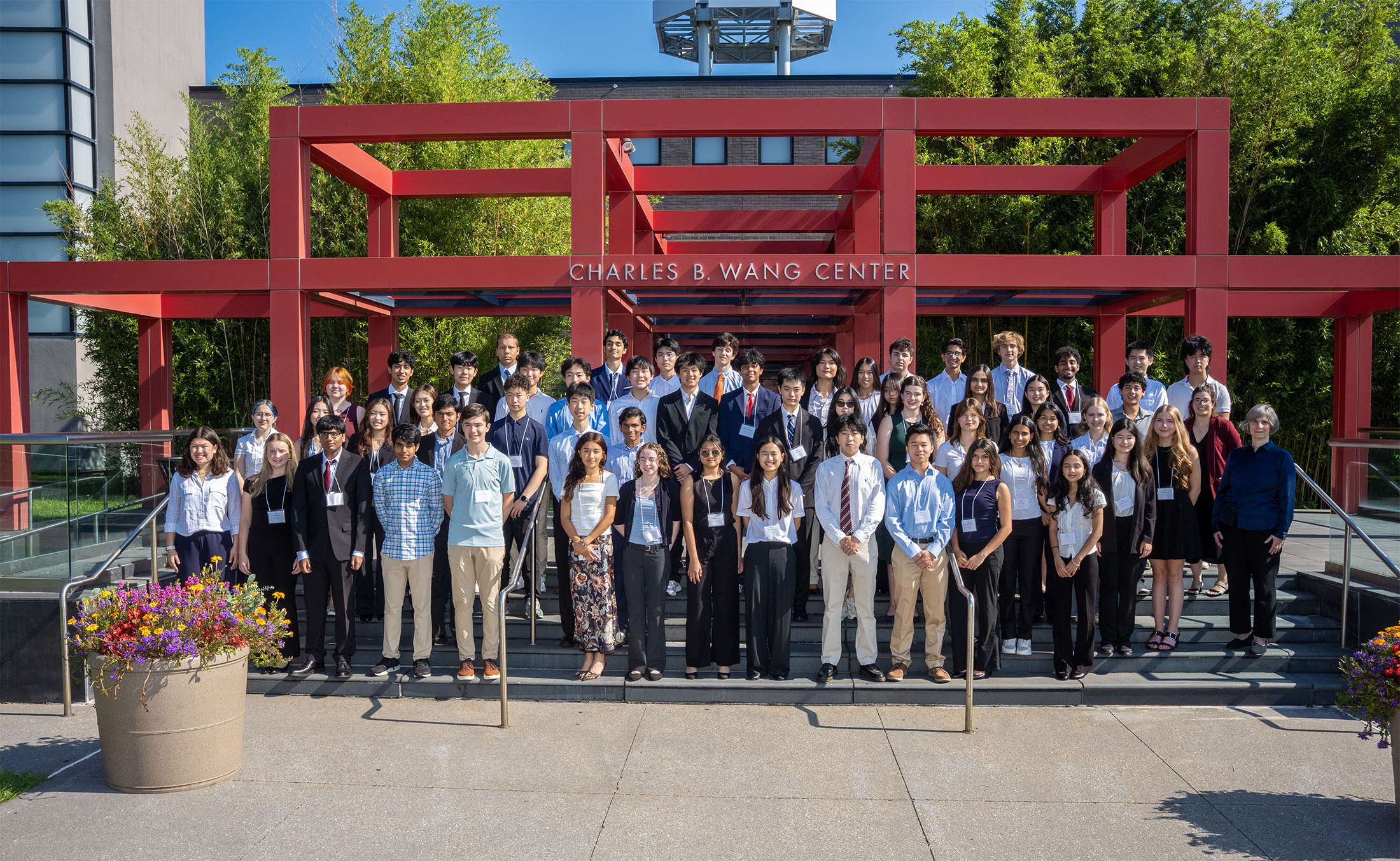 A group photo of the 2026 Simons Summer Research Program participants outside of the Charles B. Wang Center.