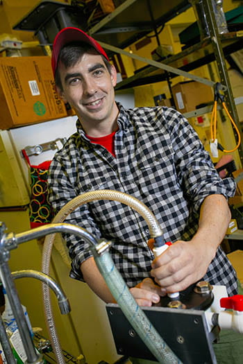 Chris Crosby at work in the Instrument Lab