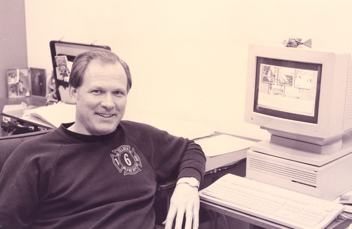 Frank Roethel sitting at his desk