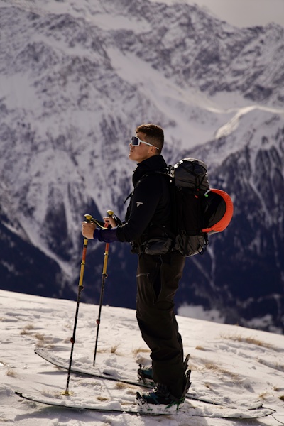 Noah Perez prepares to ski down a mountain