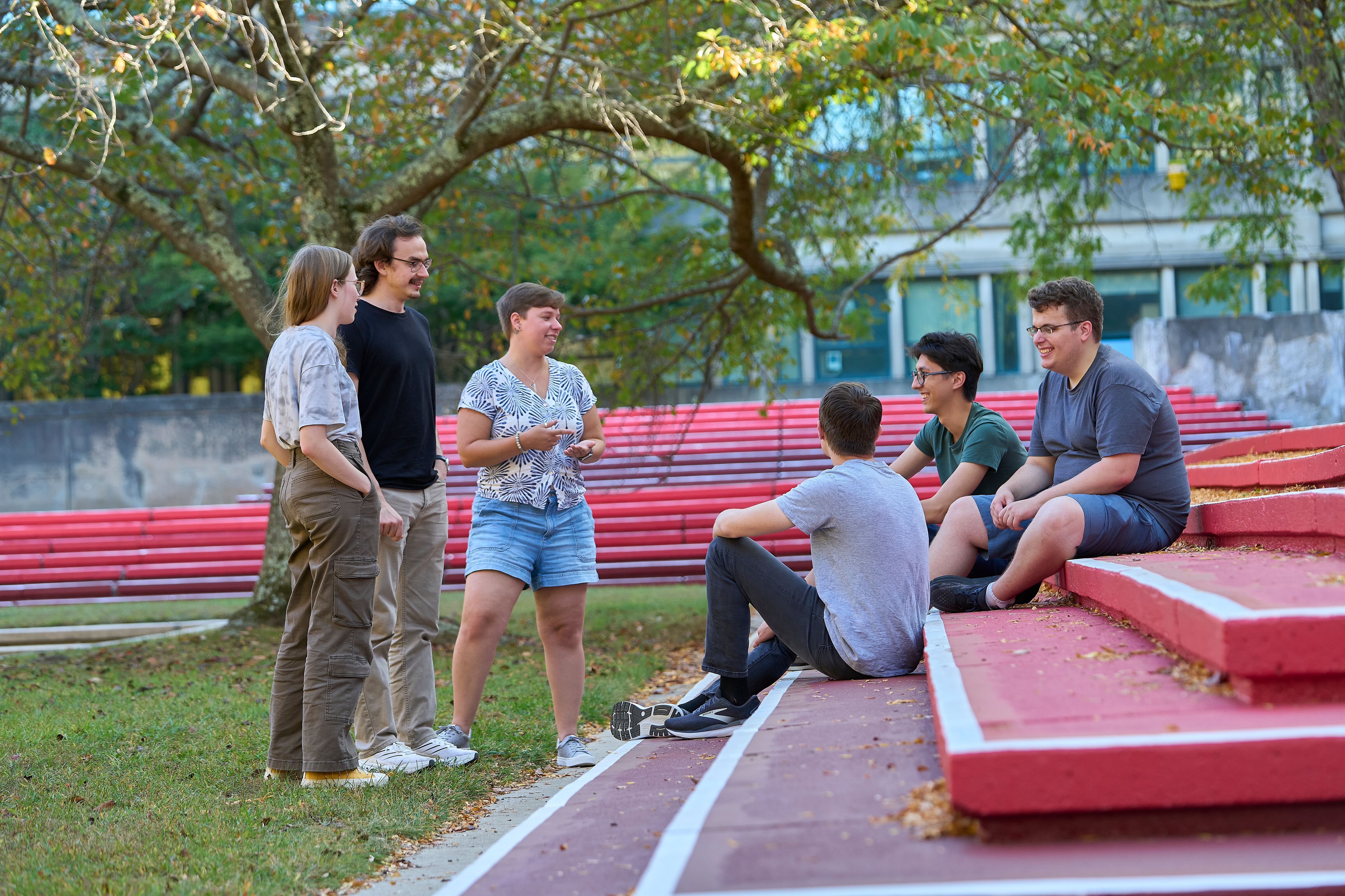 Students talking to each other on campus.