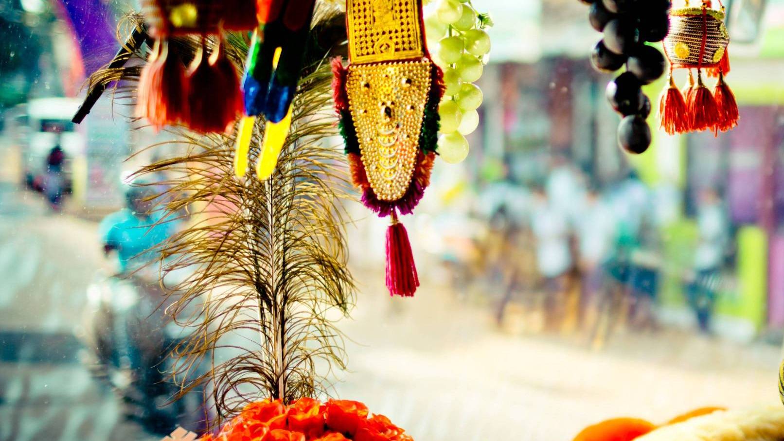 Abstract image of colorful tassels and feathers