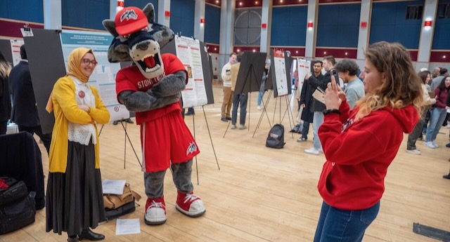 Wolfie Seawolf at a poster presentation