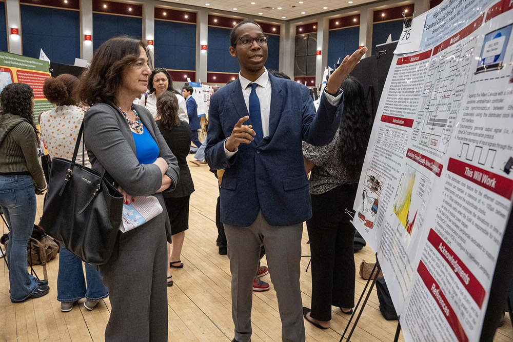 image of Simon Salmon at URECA poster symposium