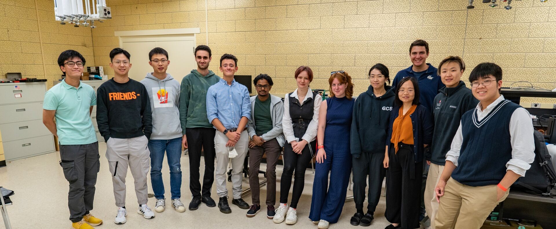 Members of the Soft Electronics VIP team standing in a line and posing for a photo.