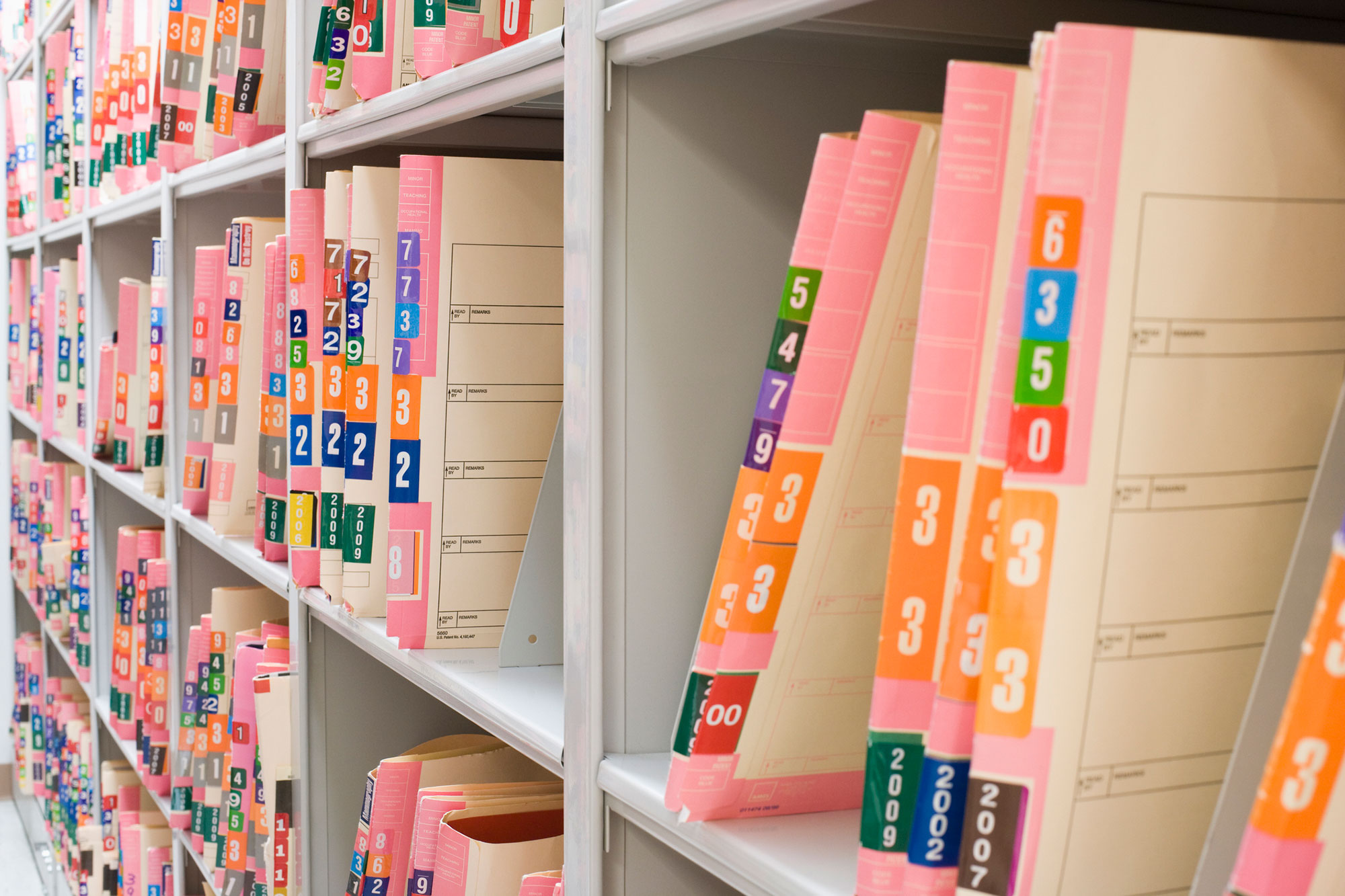 Row of file folders on a shelf