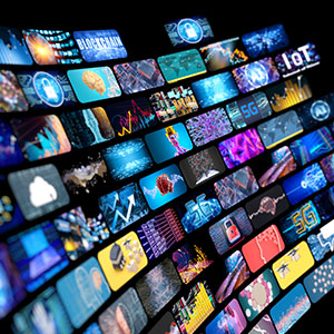Wall of image and video thumbnails on a black background