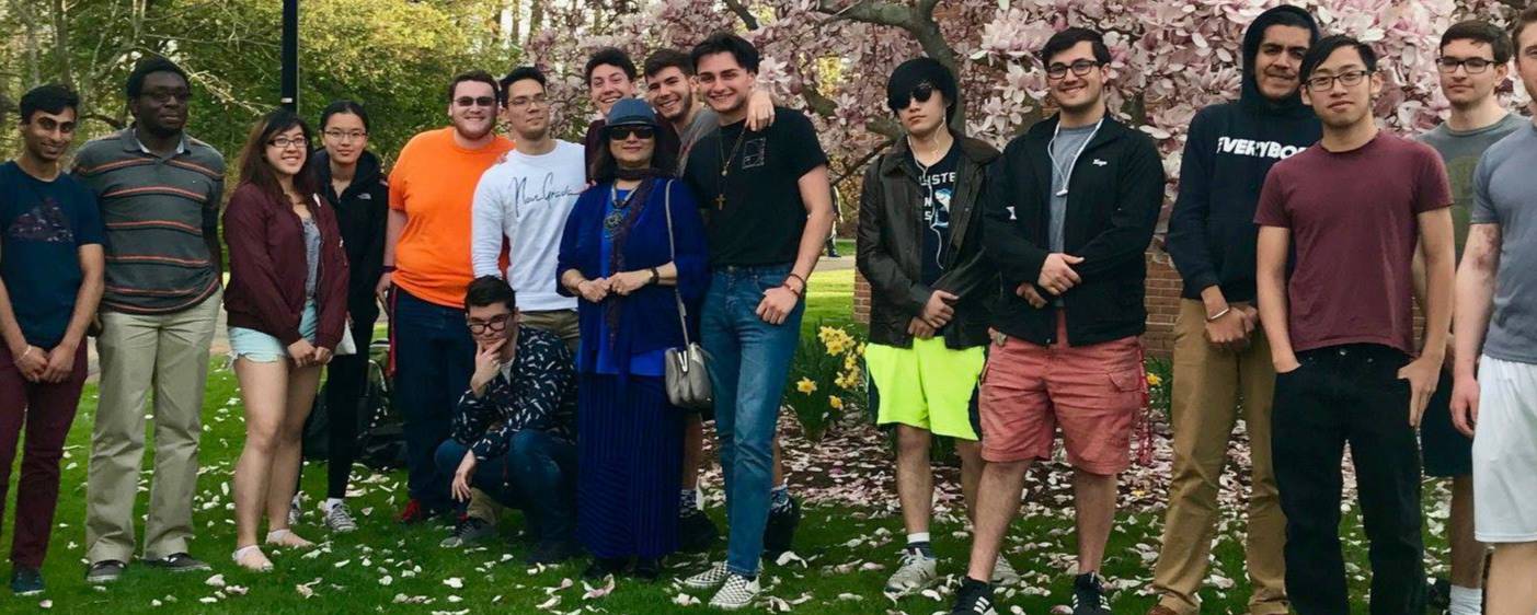 DWR home image (students under cherry tree in front of Humanities Building)