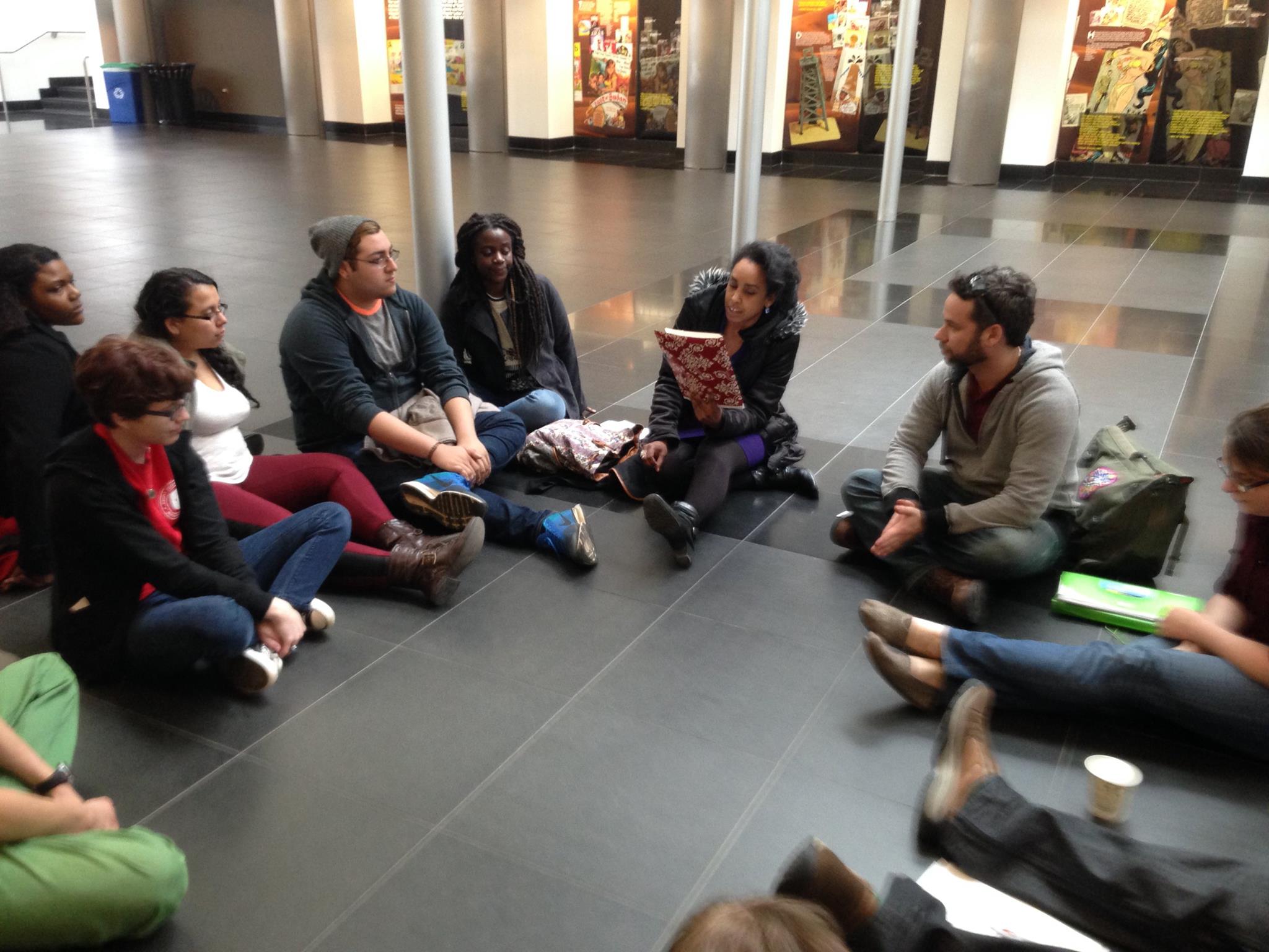 Students and faculty reading poetry in Wang Center